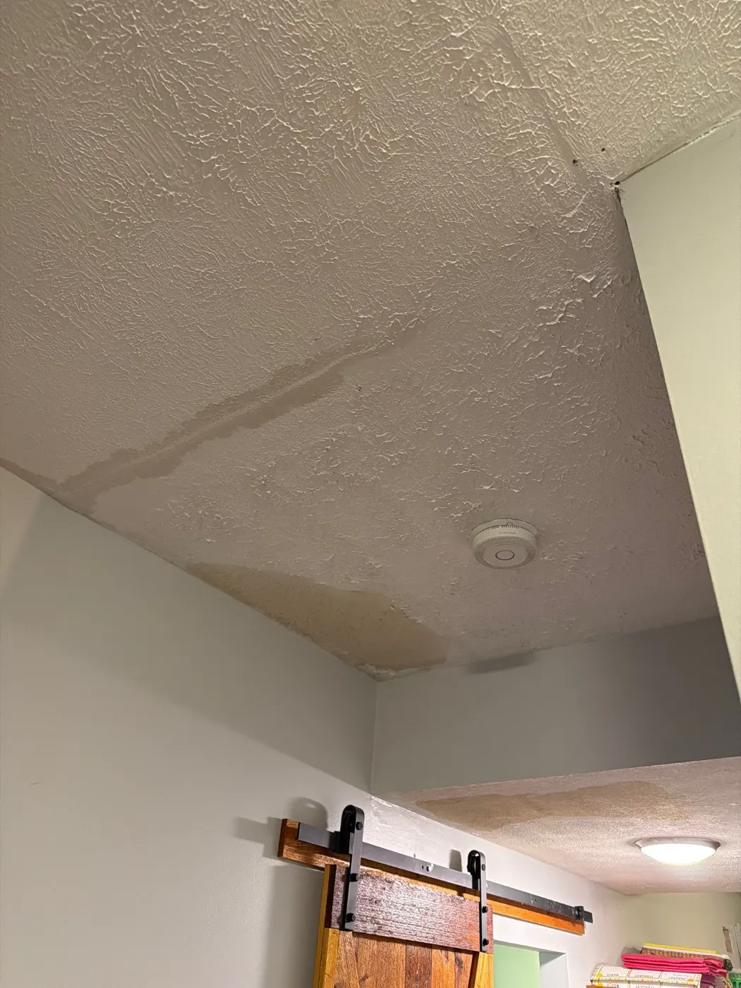 Moisture meter reading on drywall in Old Town Noblesville water loss